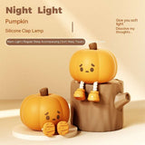 Halloween Pumpkin Night Lamp featuring soft silicone design and warm light, ideal for bedtime ambience and festive home decor.
