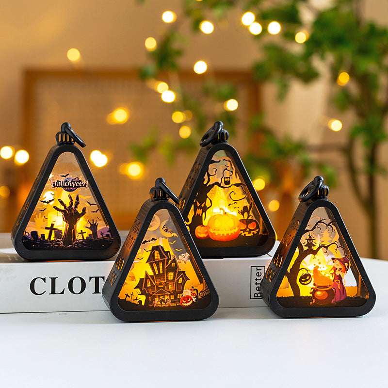 Set of four Halloween Portable Pumpkin Lamps featuring witch, haunted house, ghost hand, and pumpkin designs for festive holiday decorations.