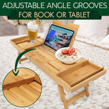 Adjustable Bamboo Bath Caddy Tray with angle grooves for holding a book or tablet, ideal for breakfast or work in bed.