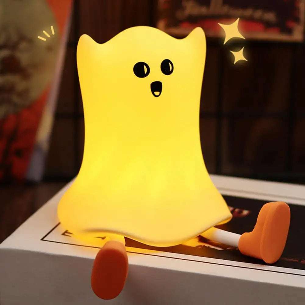 Cute Silicone Ghost Lamp with glowing body and orange shoes, ideal for Halloween decorations and children's night light use.