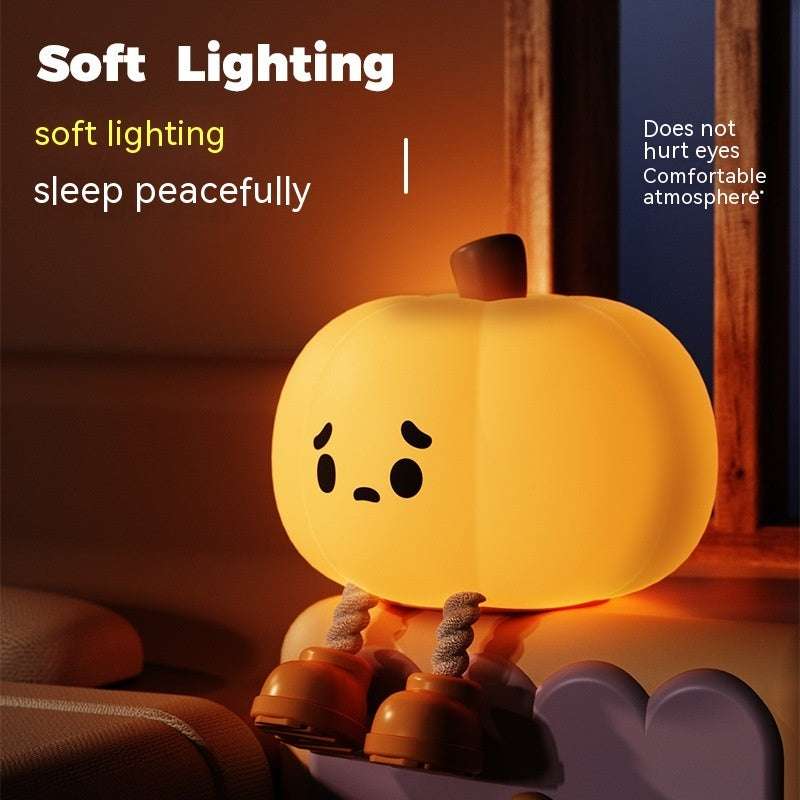 Soft lighting silicone pumpkin lamp with USB charging, perfect for Halloween decor and peaceful sleep environment.