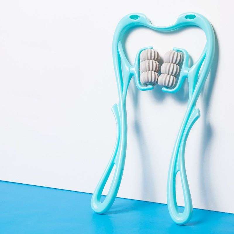 Blue 6 Roller Neck Massager standing upright, showcasing ergonomic design and six rotating rollers for deep tissue massage.